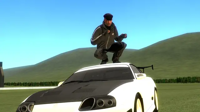 Player sitting on the roof of a white Supra