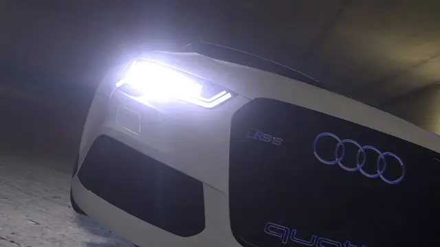Audi headlight close-up at dusk