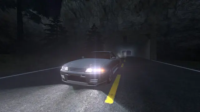 Headlights on in the midnight parking lot
